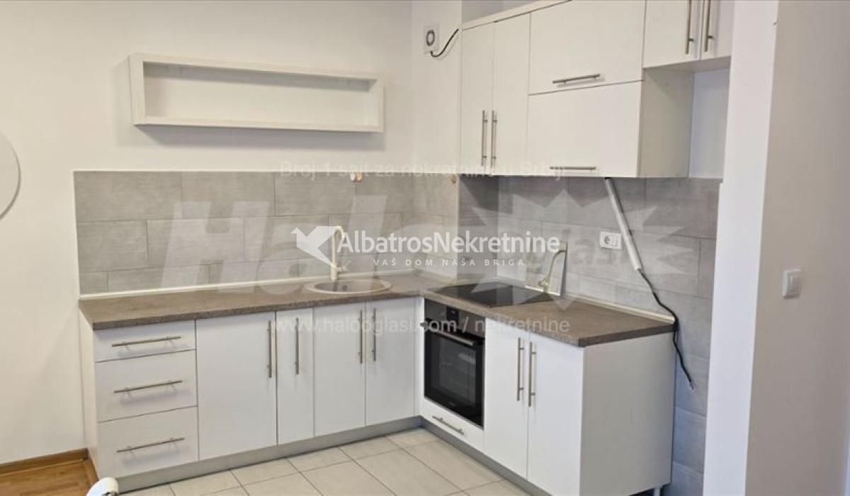 Dvosoban stan u Zemunu, Dobanovačka nova zgrada